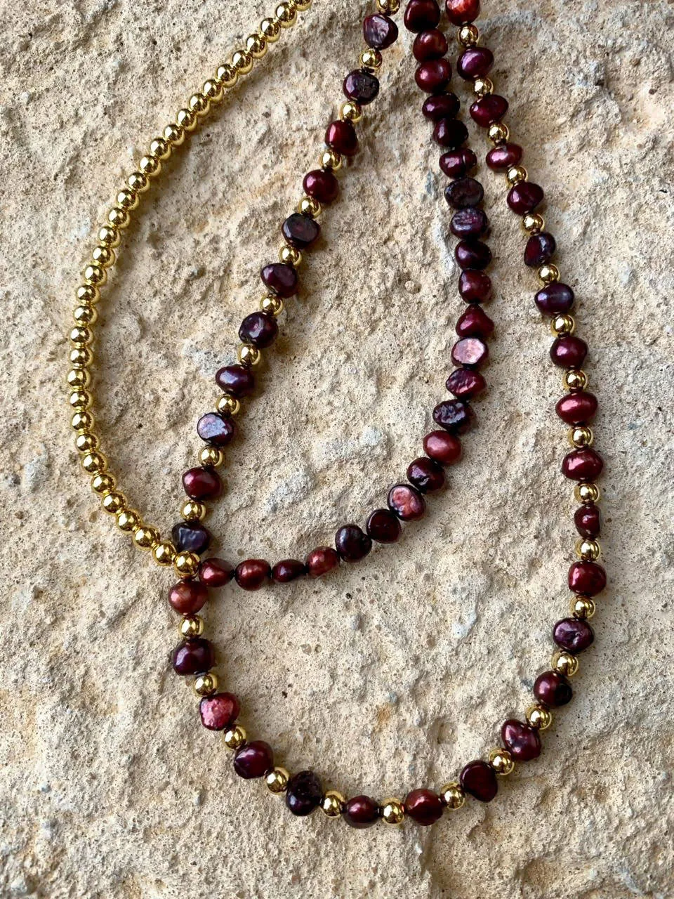 Red freshwater pearl choker with gold color beads all around